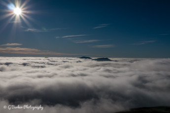 The Moelwyns rise out of a cloud inversion